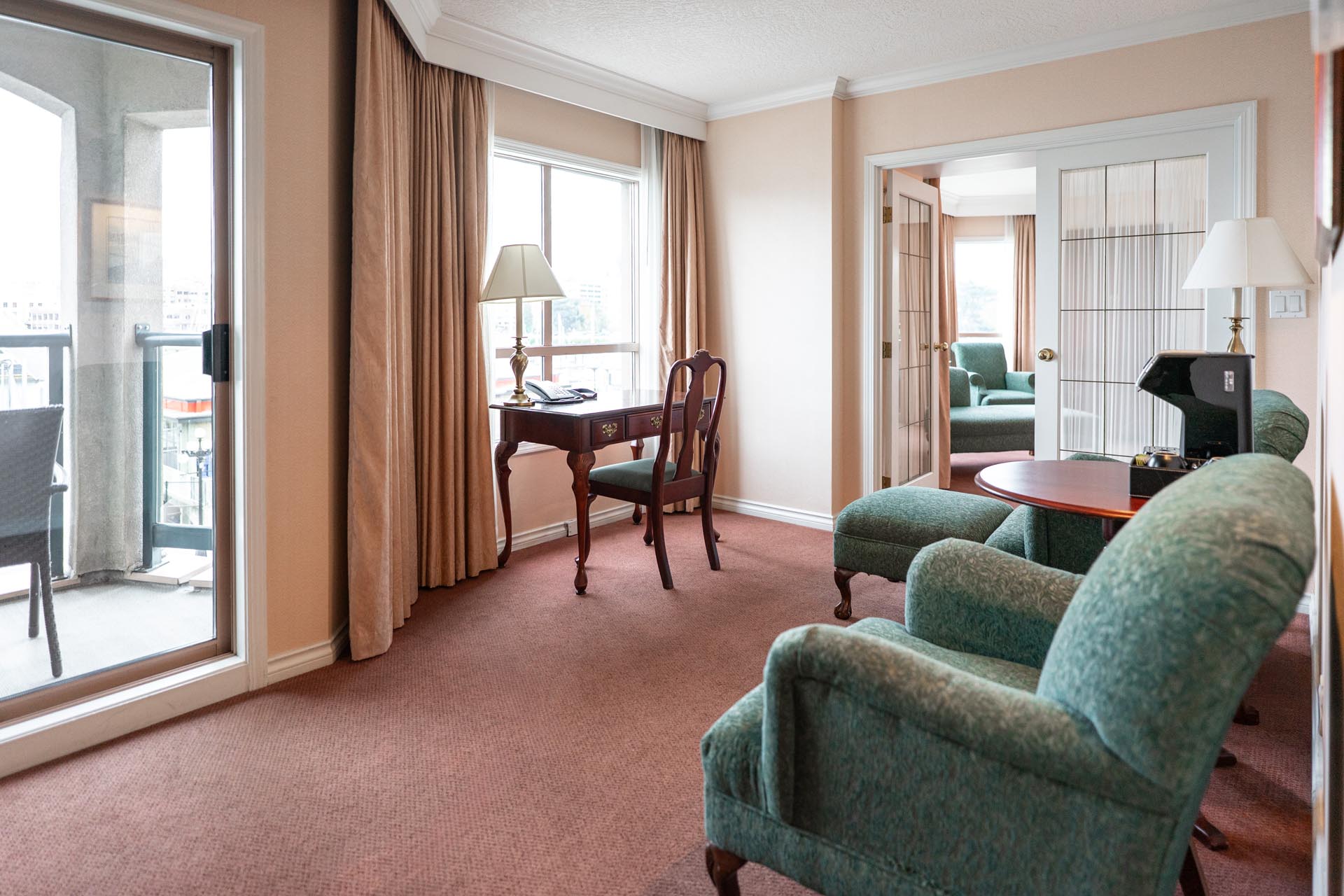 Living room with green armchairs