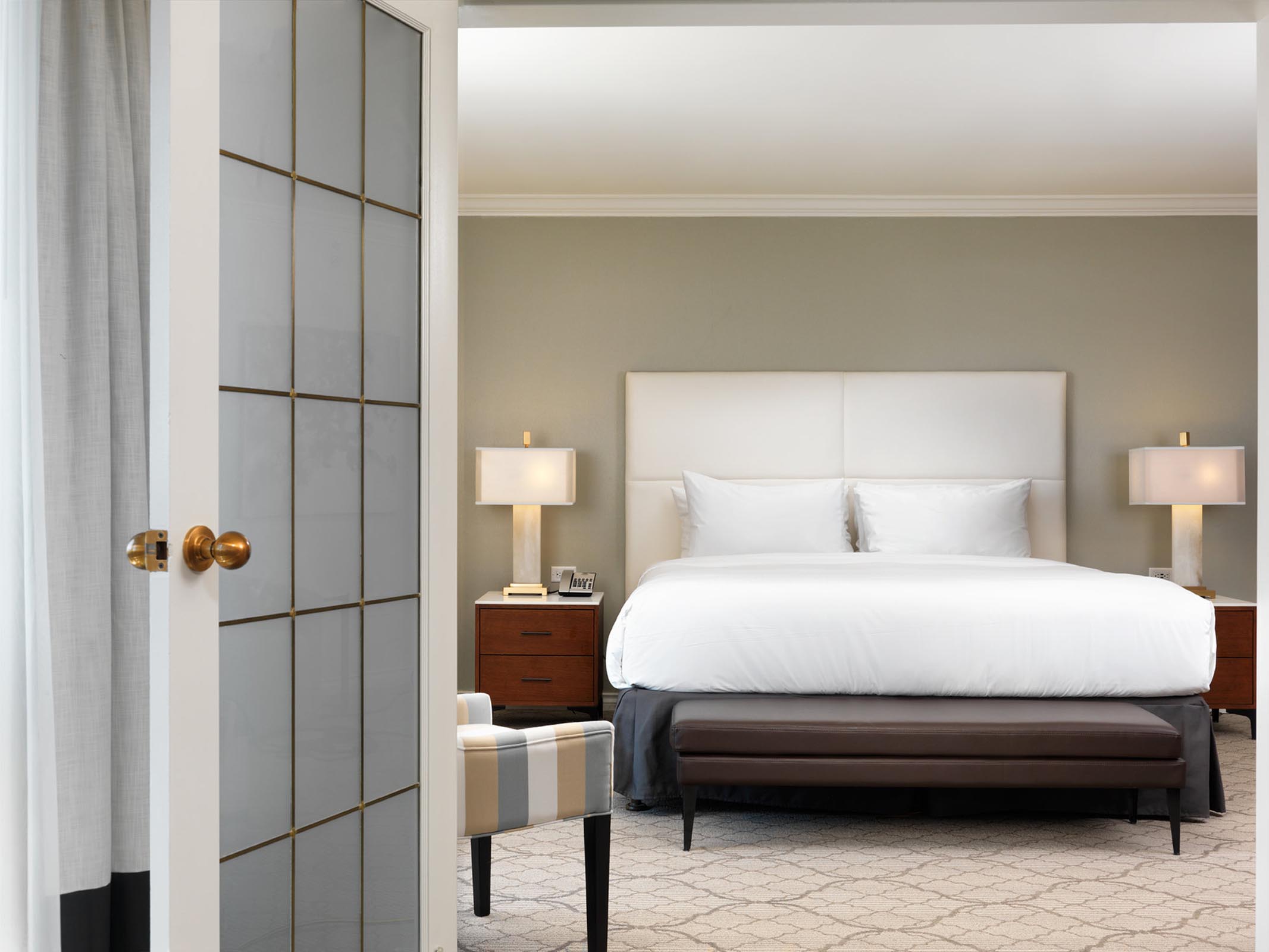 A king bed and French doors